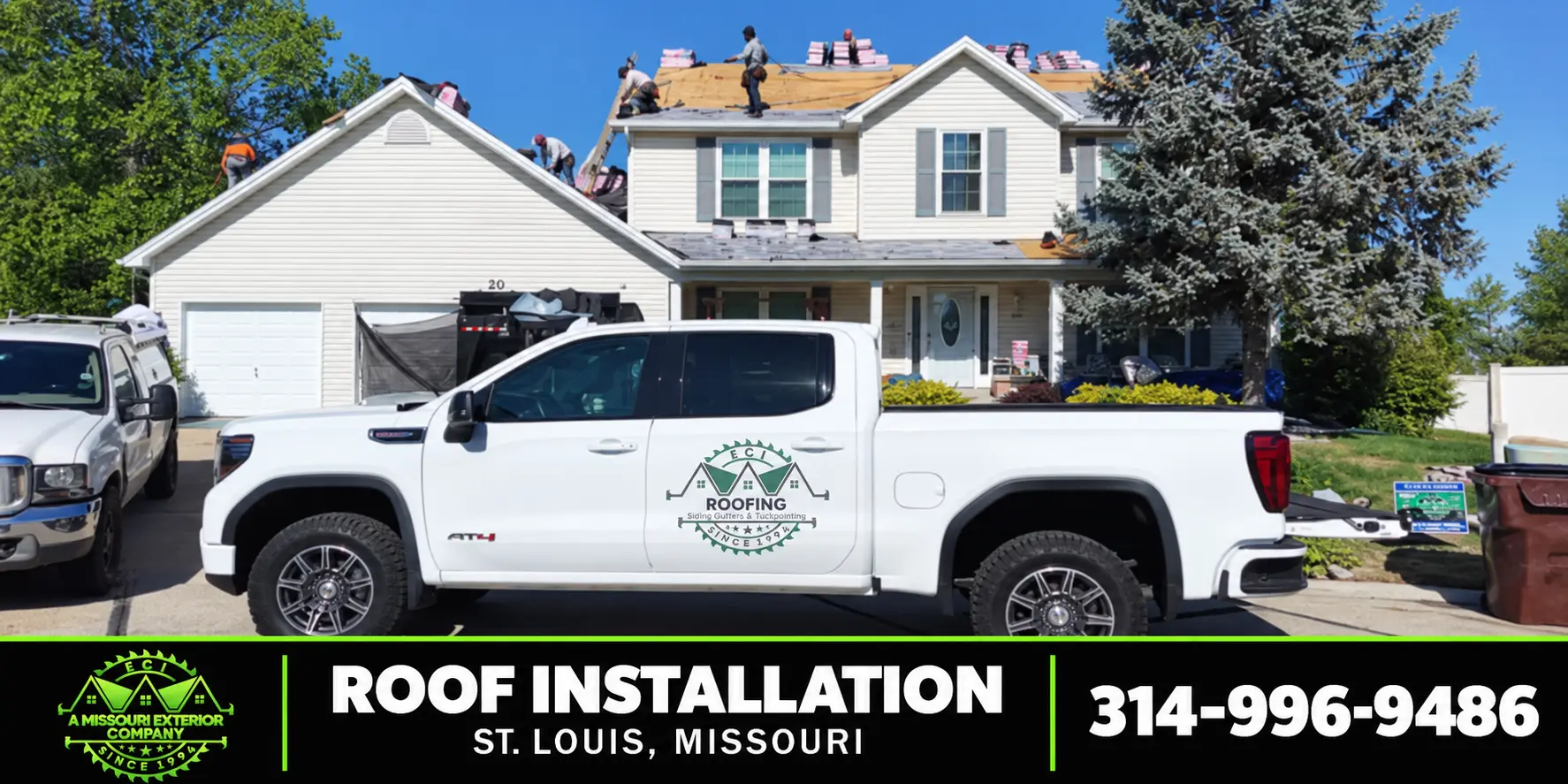 ECI truck and crew installing a new roof on a two-story home in St. Louis