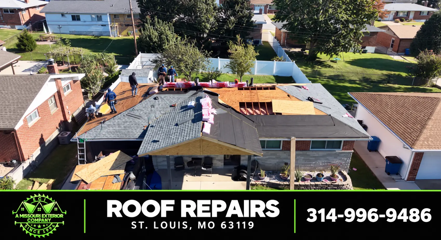 ECI crew members working a roof repair on a St. Louis home