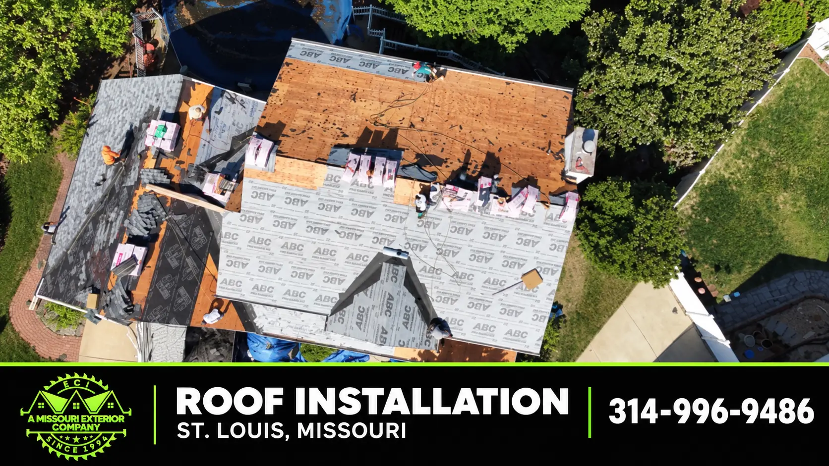 Top-down aerial of an ECI roof installation with decking and underlayment in St. Louis