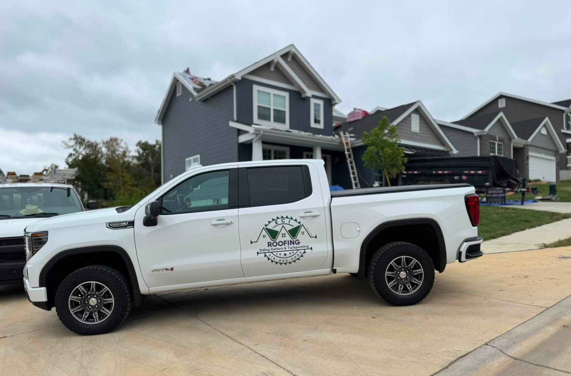 ECI truck parked at a two-story home during installation