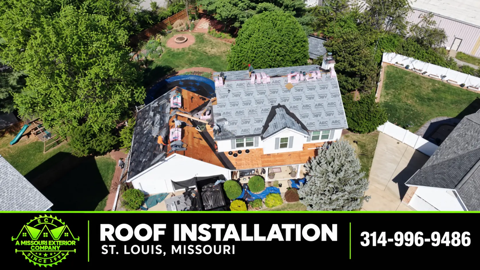 Aerial of an ECI crew mid-installation on a St. Louis roof