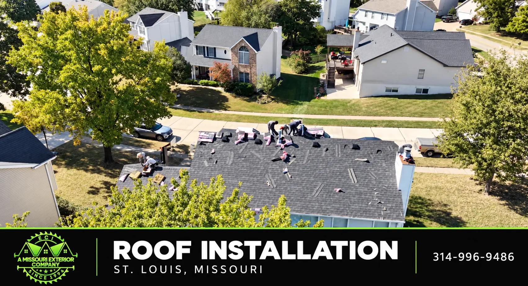 Aerial of ECI crew members installing a new roof on a home with a deck