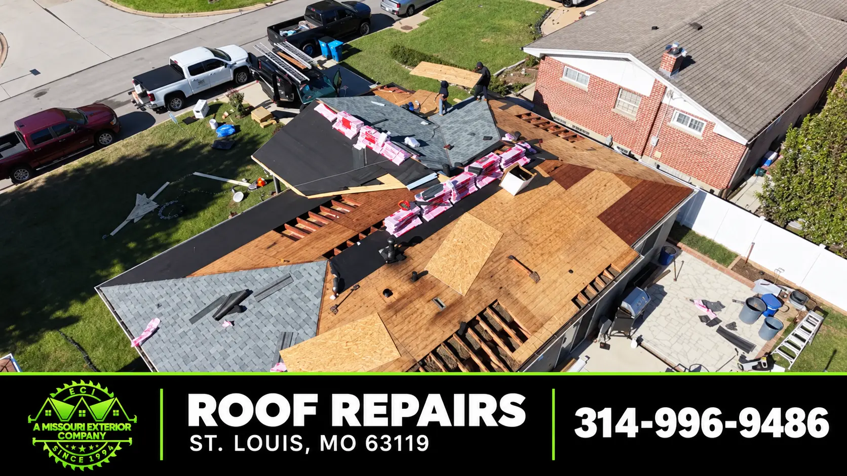 ECI trucks and crew at a St. Louis roof repair with exposed decking