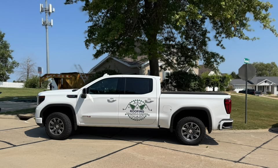 ECI truck in a Missouri neighborhood near an active jobsite