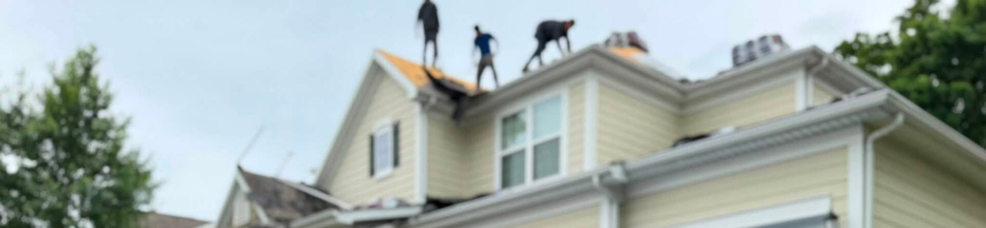 ECI roofing crew replacing shingles on a Missouri home