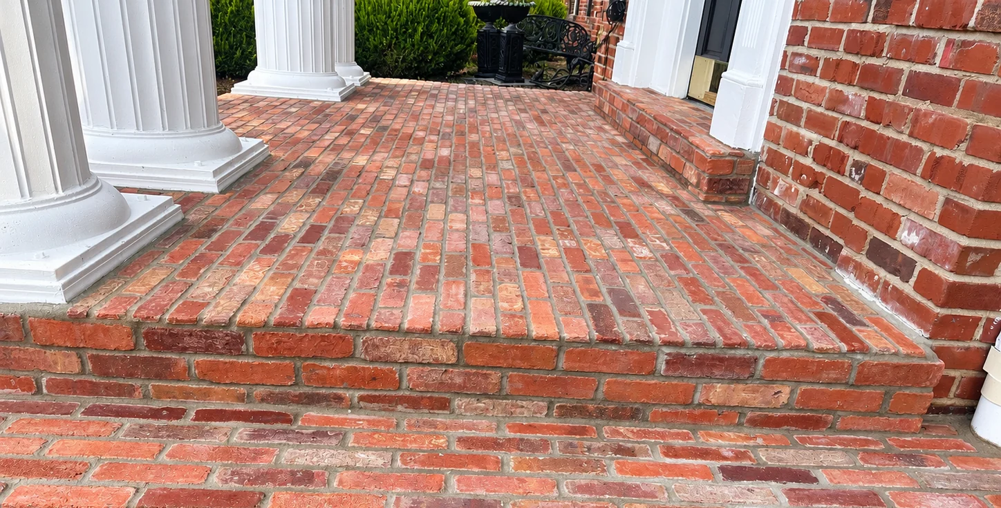 Completed red brick porch and entry steps