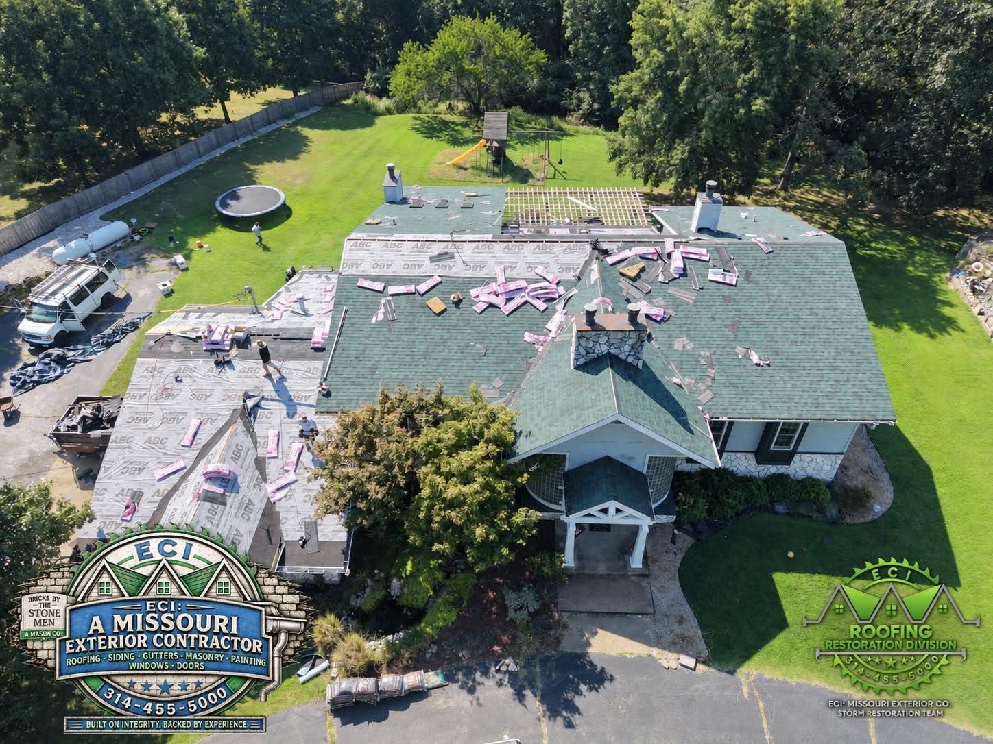 Storm restoration on a large home, aerial